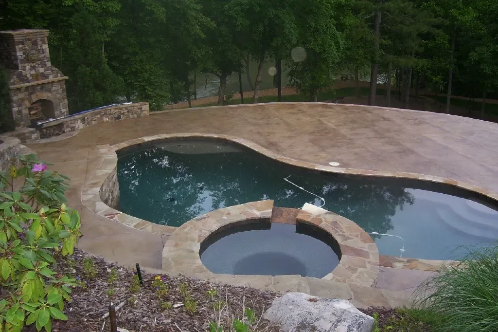 Smooth resurfaced concrete surface with rich color by JP Concrete Creations