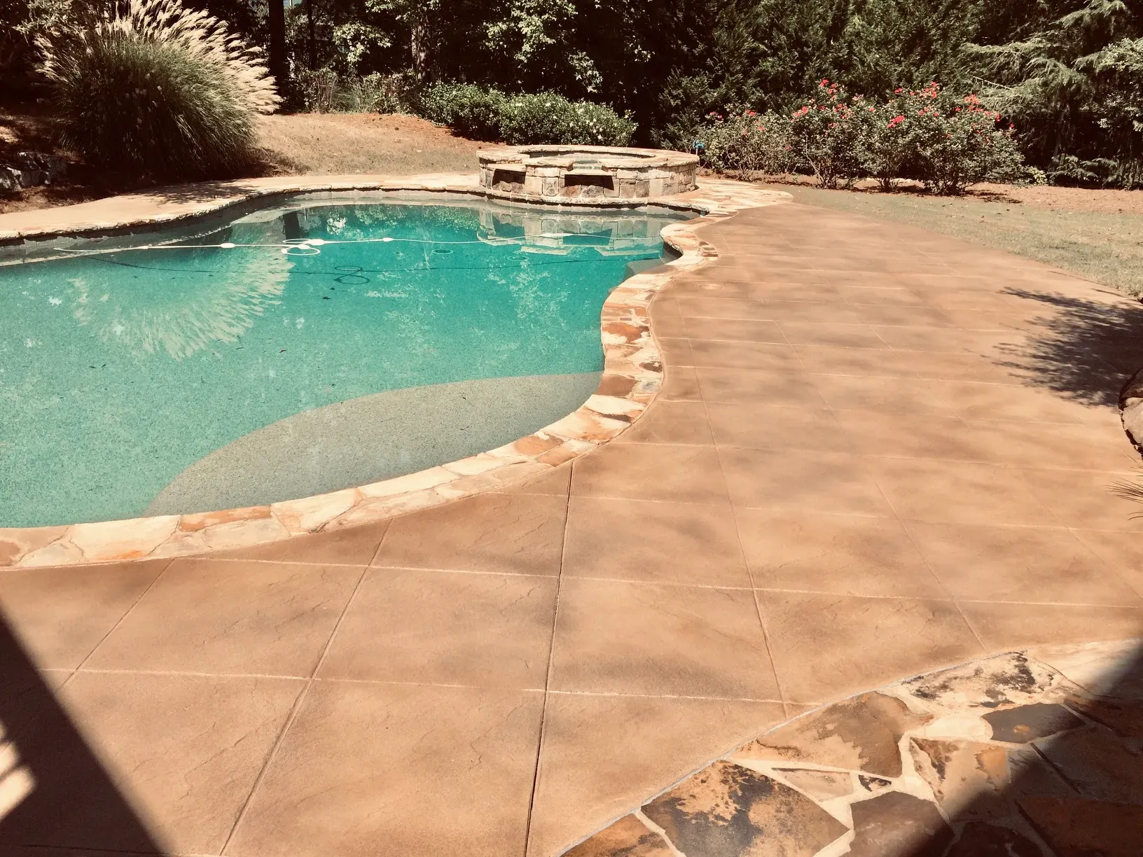 Decorative concrete pool deck resurfacing project completed in the Kennesaw area