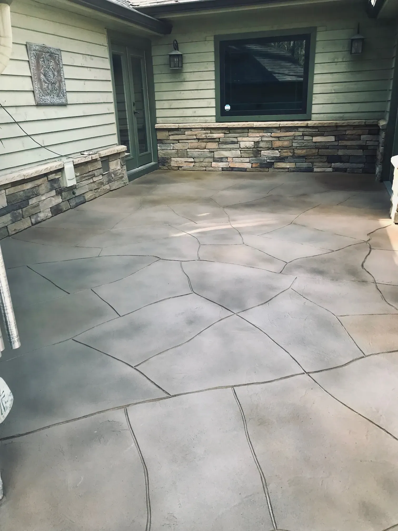 Resurfaced concrete patio with fresh custom finish at a metro Atlanta home