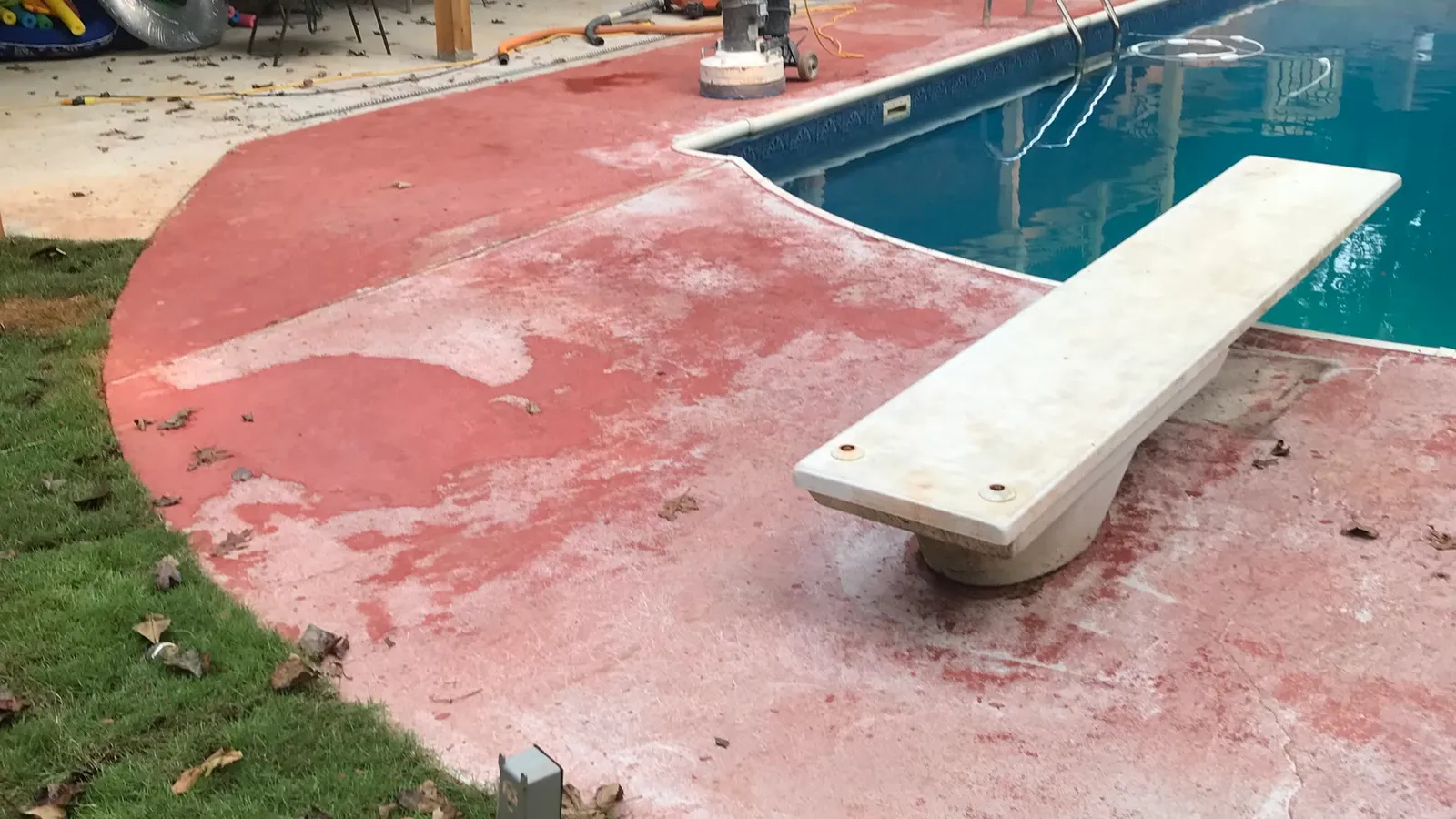 Faded, cracked pool deck before resurfacing by JP Concrete Creations