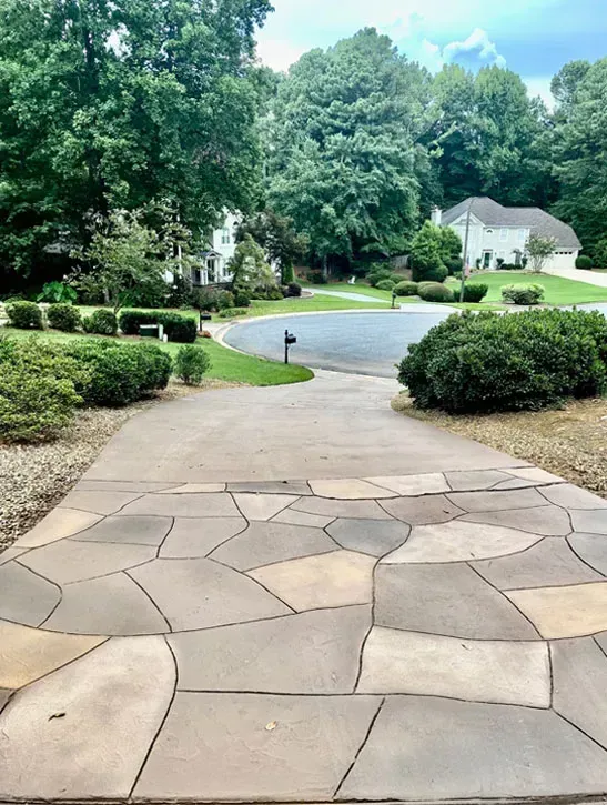 Custom stained concrete driveway by JP Concrete Creations in Georgia